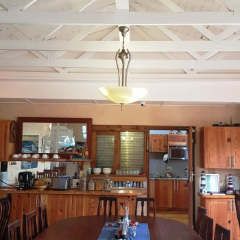 2018 breakfast room dining table beams Dining room with high vaulted ceilings