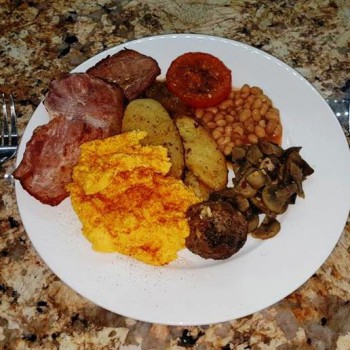 English breakfast - scrambled English breakfast with scrambled eggs